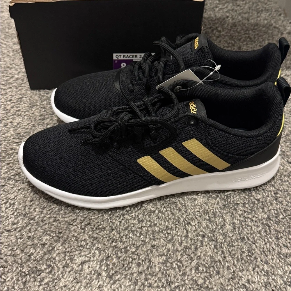 adidas Women’s Black Athletic Sneakers with Gold Three-Stripes - Picture 2 of 4